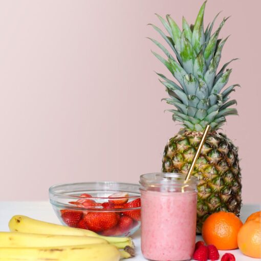 strawberry smoothie on glass jar