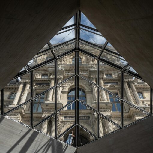 iconic louvre pyramid glass structure in paris